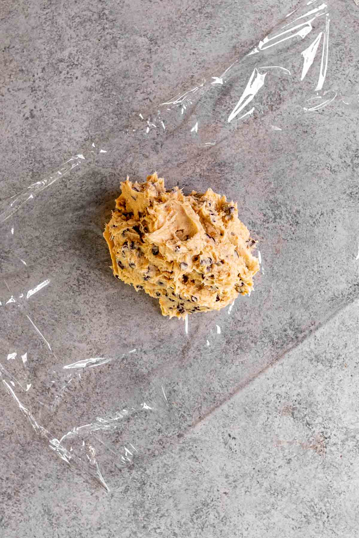 Cookie Dough Cheese Ball mixture on plastic wrap