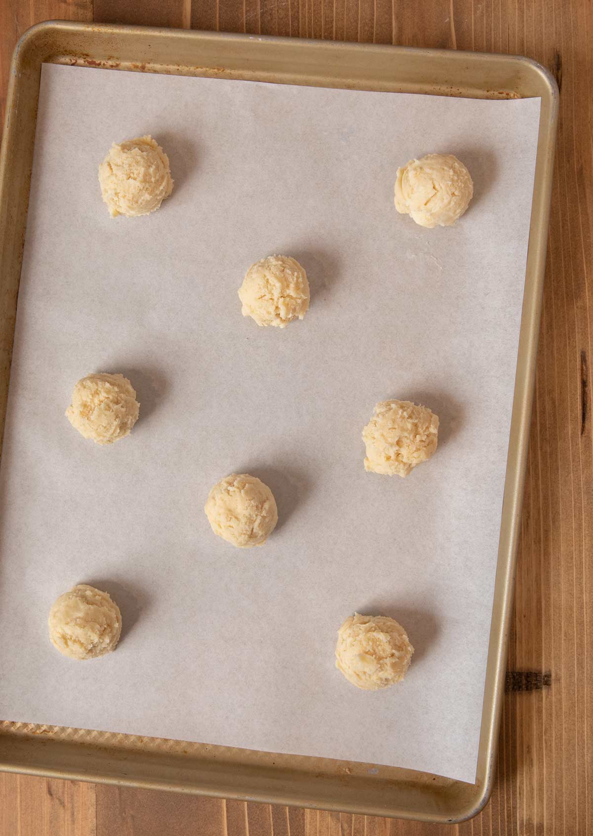 Cream Cheese Cookies dough balls on cookie sheet