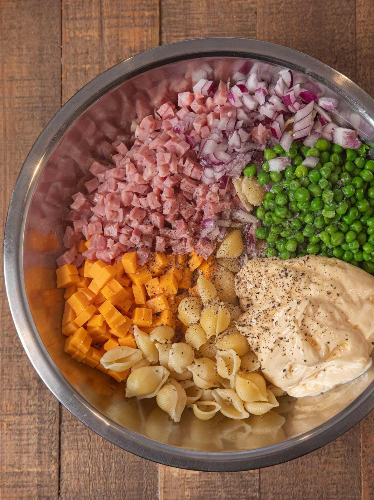 Ham and Cheese Pasta Salad ingredients in mixing bowl