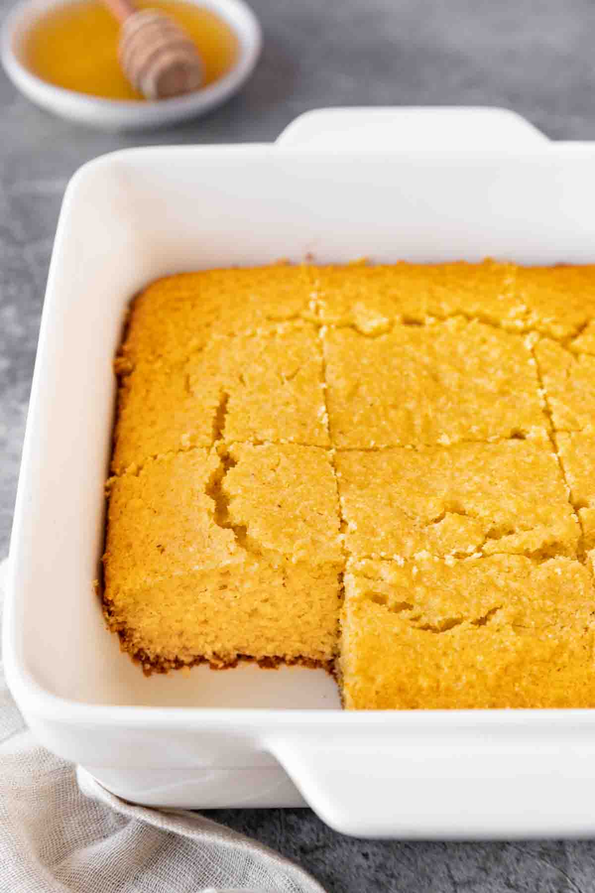 Honey Cornbread sliced in baking dish