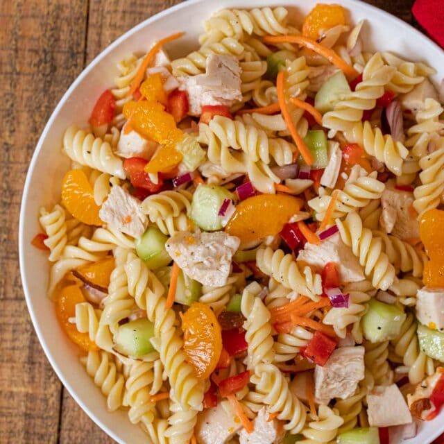 Mandarin Chicken Pasta Salad cropped in small white bowl