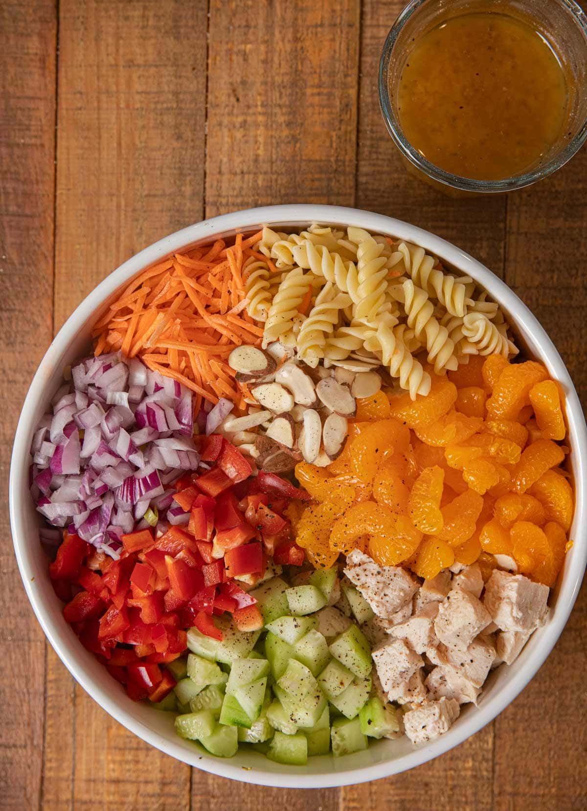 Mandarin Chicken Pasta Salad ingredients in white bowl