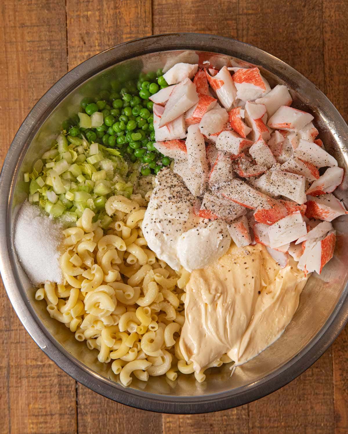 Seafood Pasta Salad ingredients in bowl