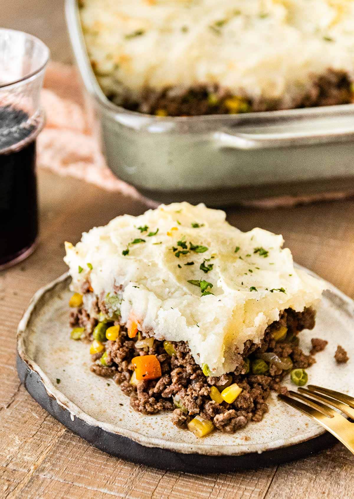 Beef Shepherd's Pie slice on plate with fork