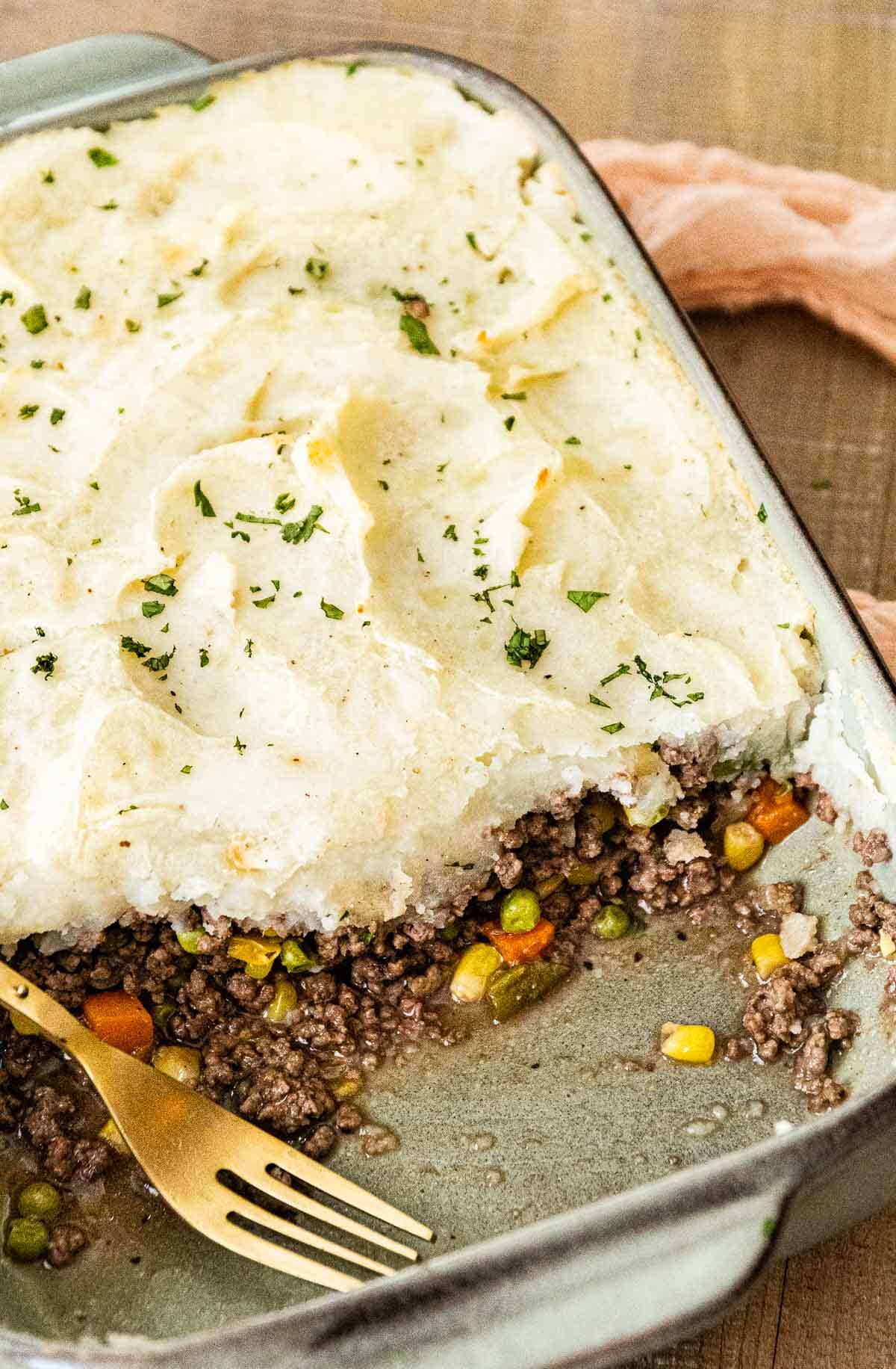 Beef Shepherd's Pie in baking dish with fork