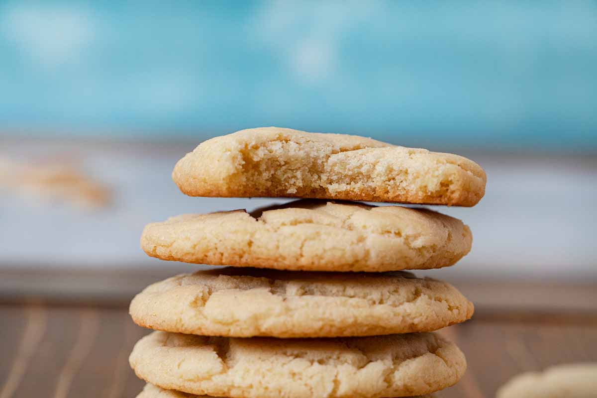 stack of sugar cookies with a bite taken out