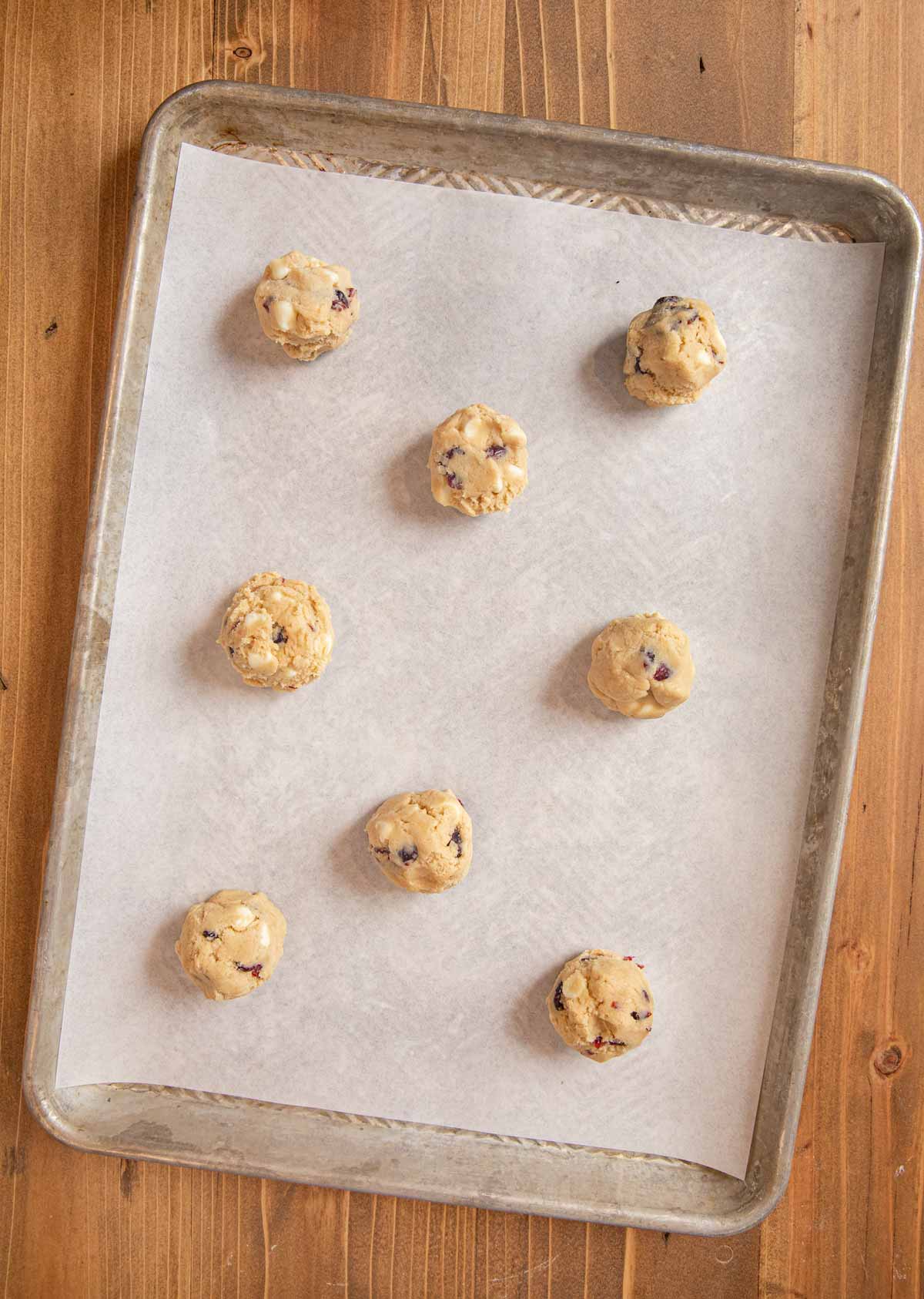 White Chocolate Cranberry Cookies dough balls on cookie sheet