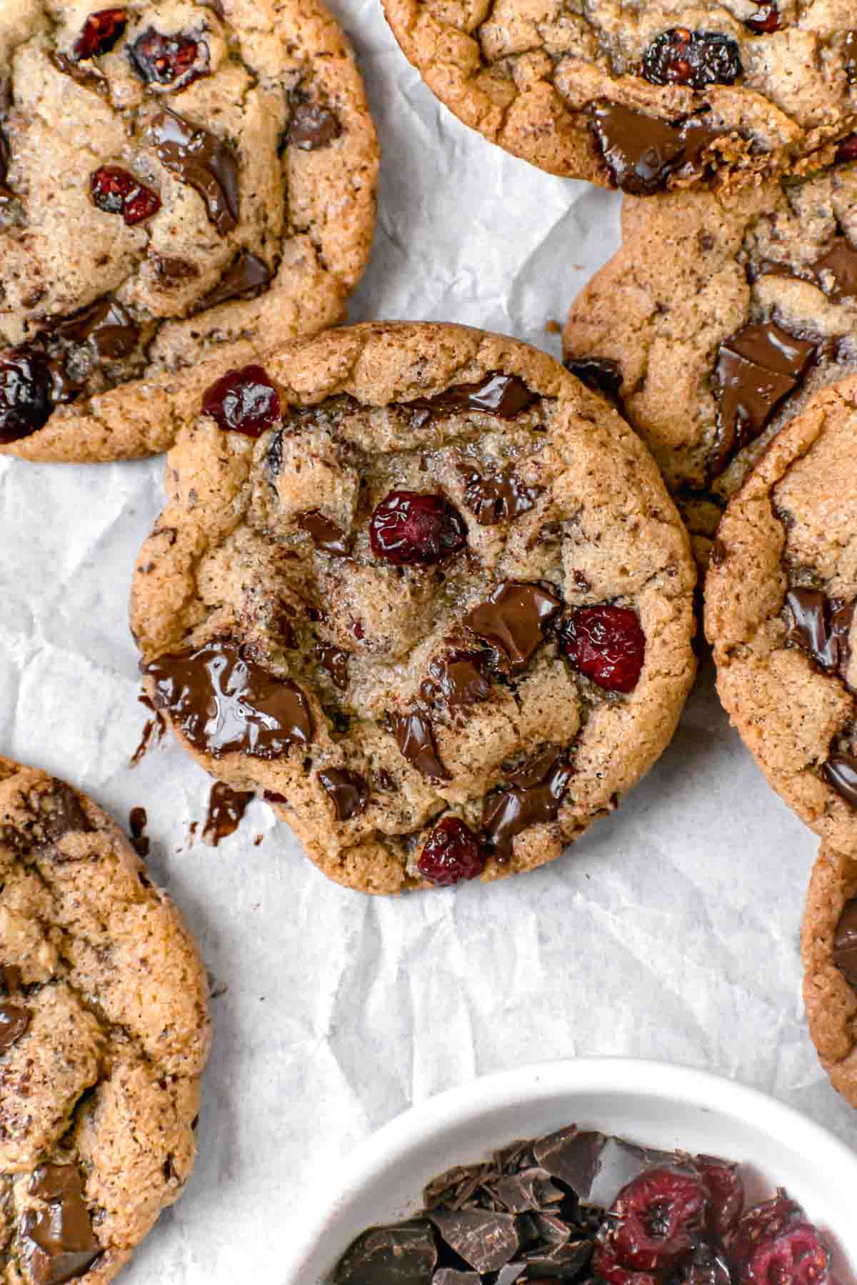 Cranberry Chocolate Chunk Cookies on parchment