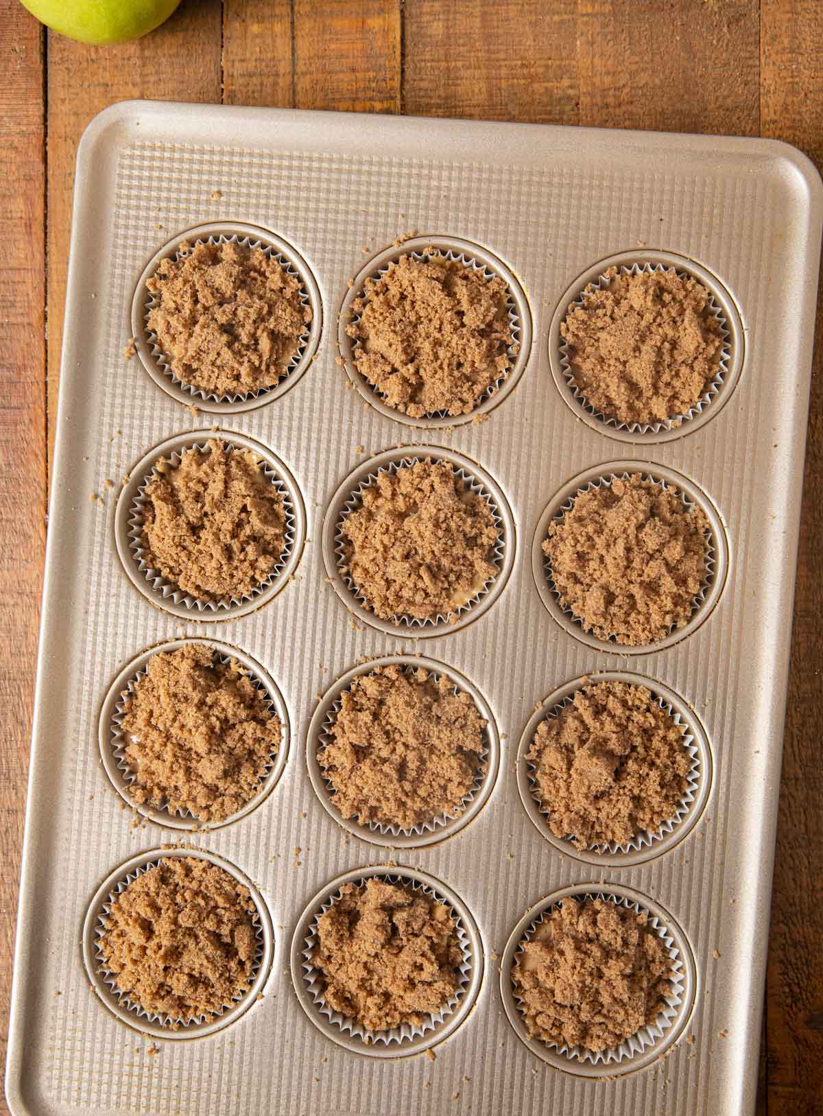 Apple Pie Muffins batter in cupcake tin before baking