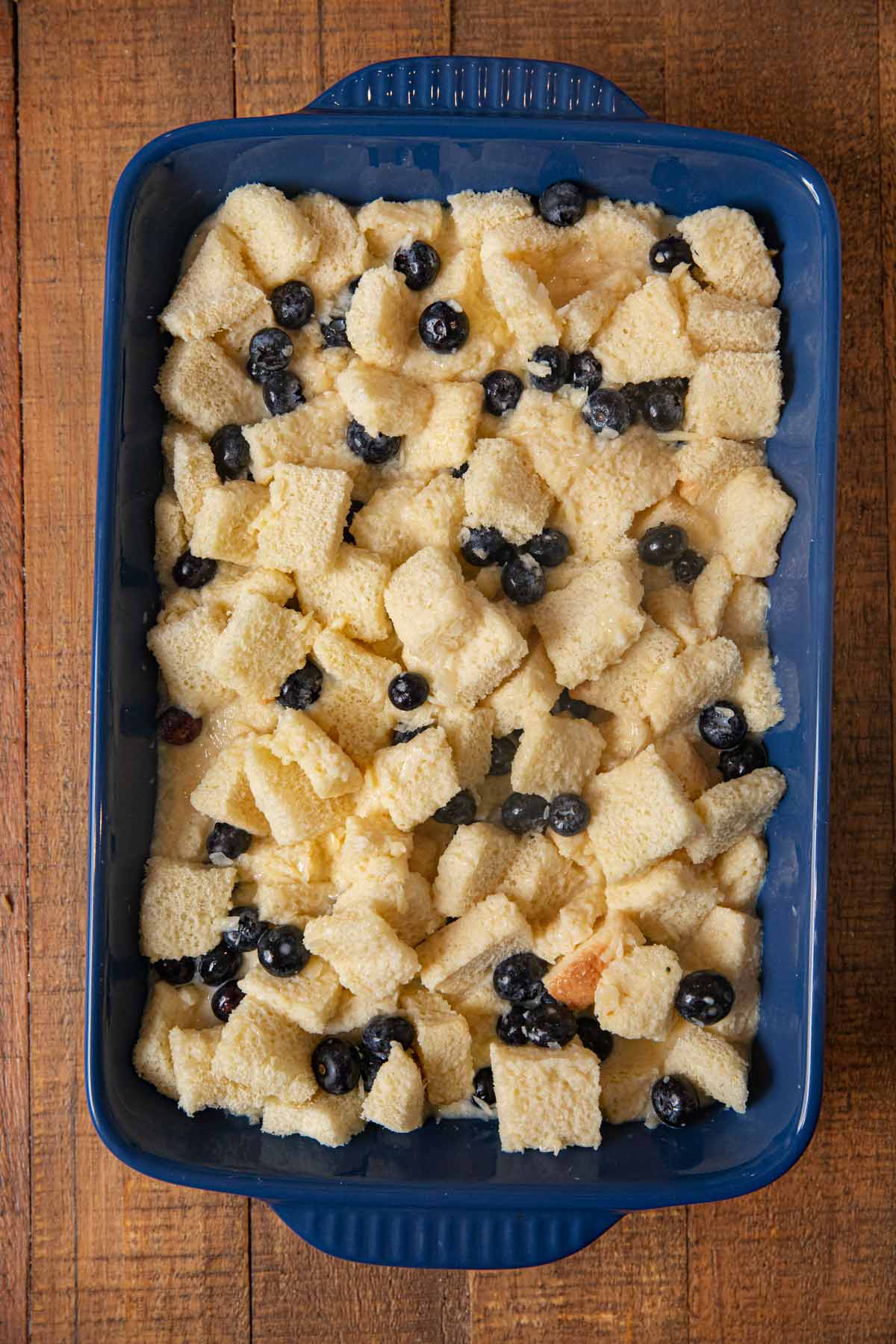 Blueberry Bread Pudding in baking dish before baking