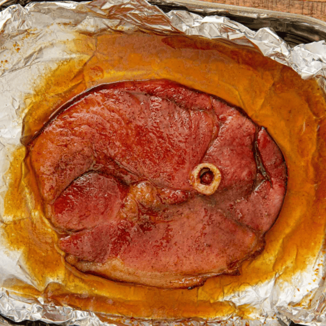finished ham in baking dish