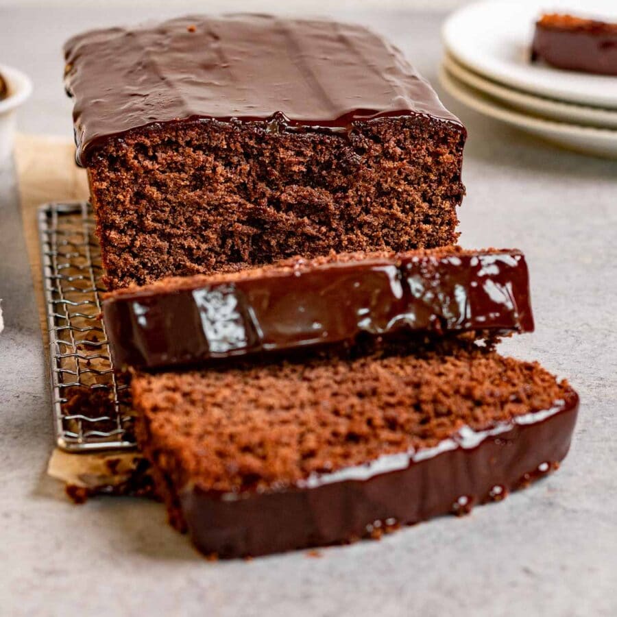 Chocolate Pound Cake with chocolate ganache sliced on parchment