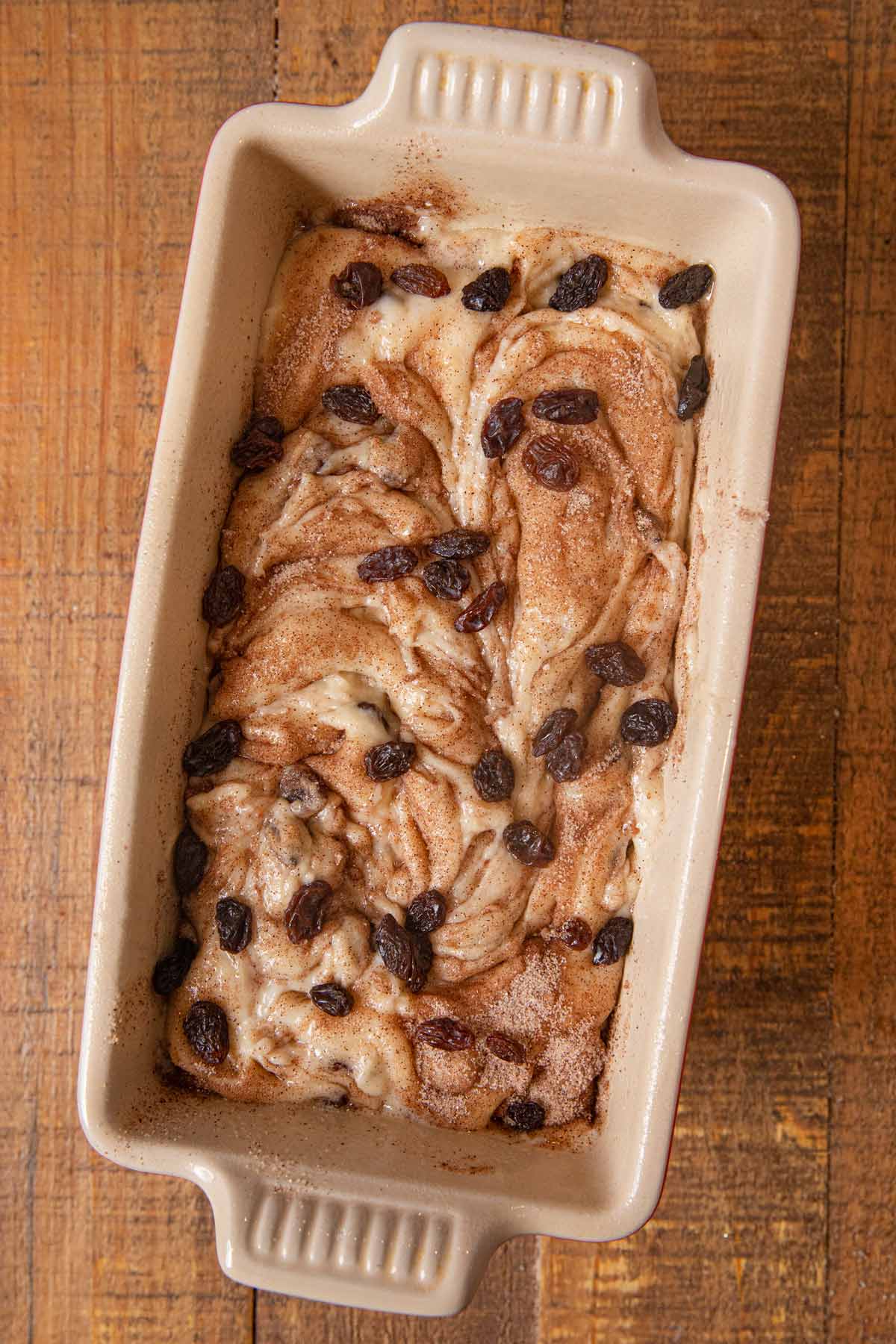 Cinnamon Raisin Bread dough in loaf pan