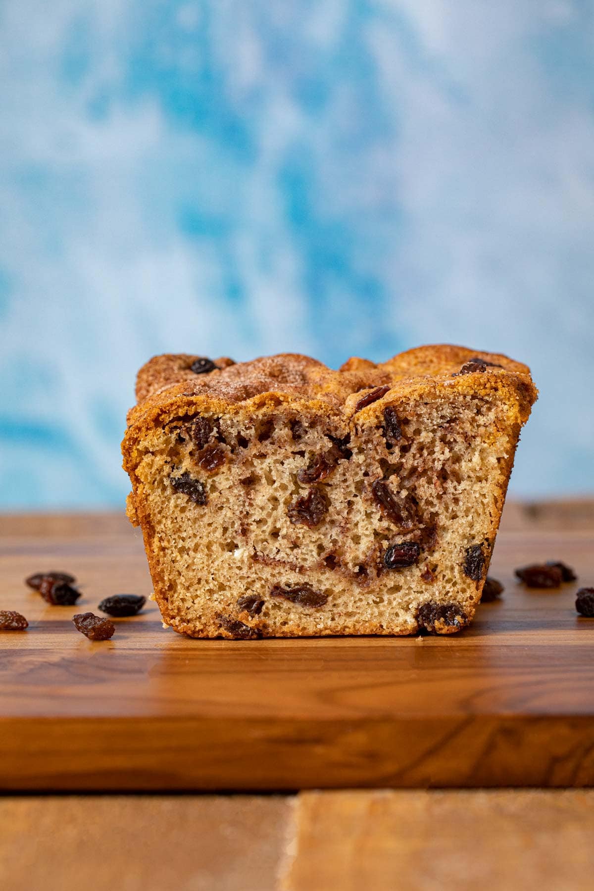 Cinnamon Raisin Bread cross-section on cutting board