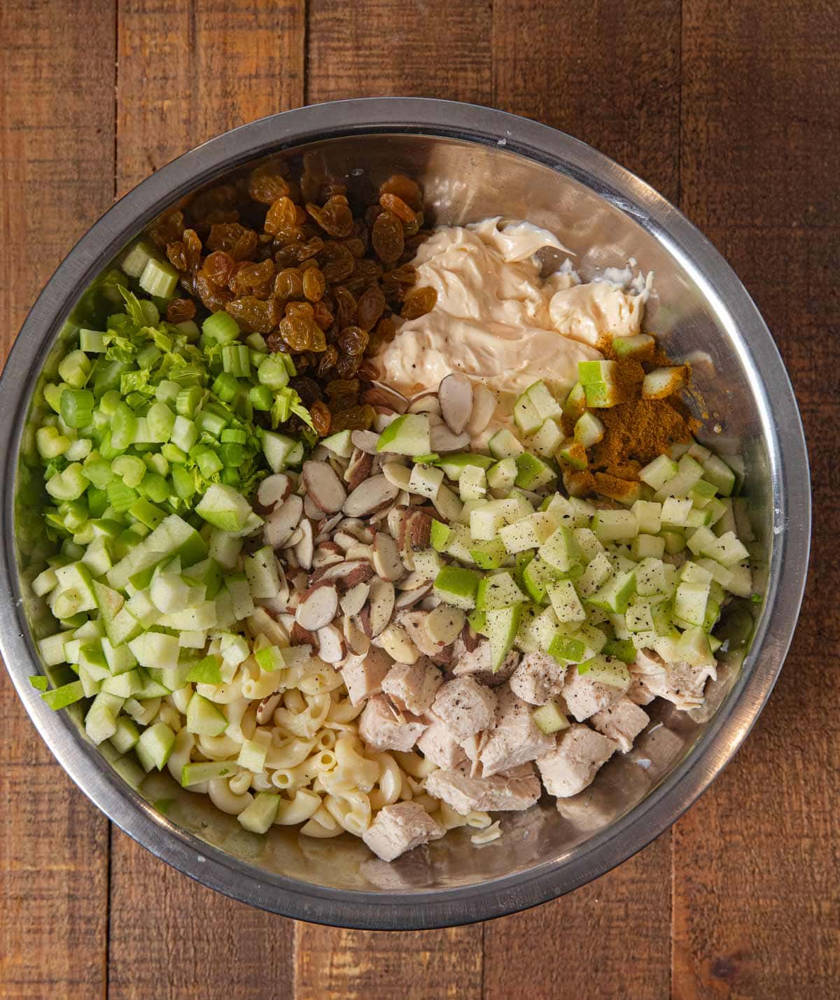 Curried Chicken Pasta Salad ingredients in mixing bowl