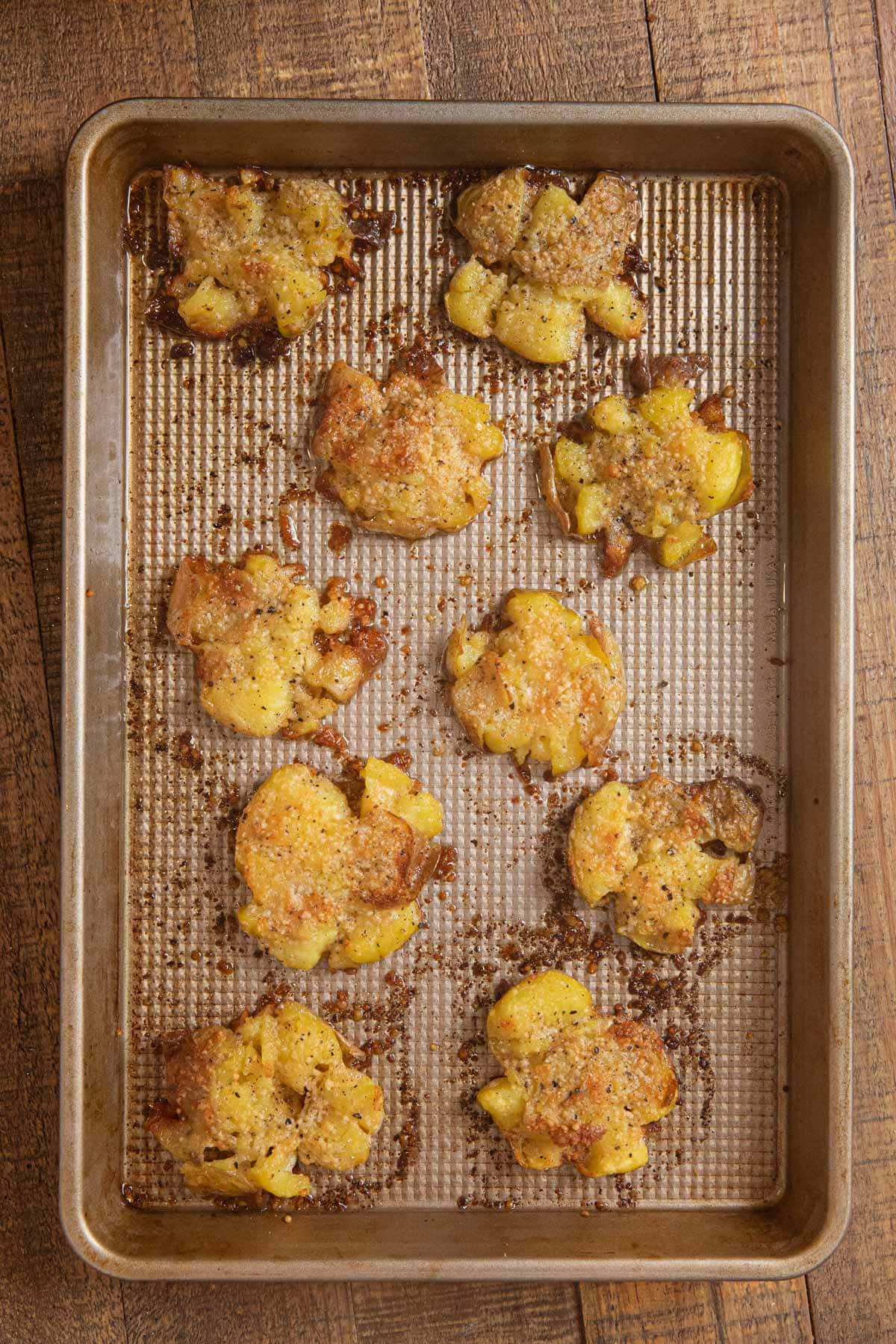 Garlic Smashed Potatoes on baking sheet