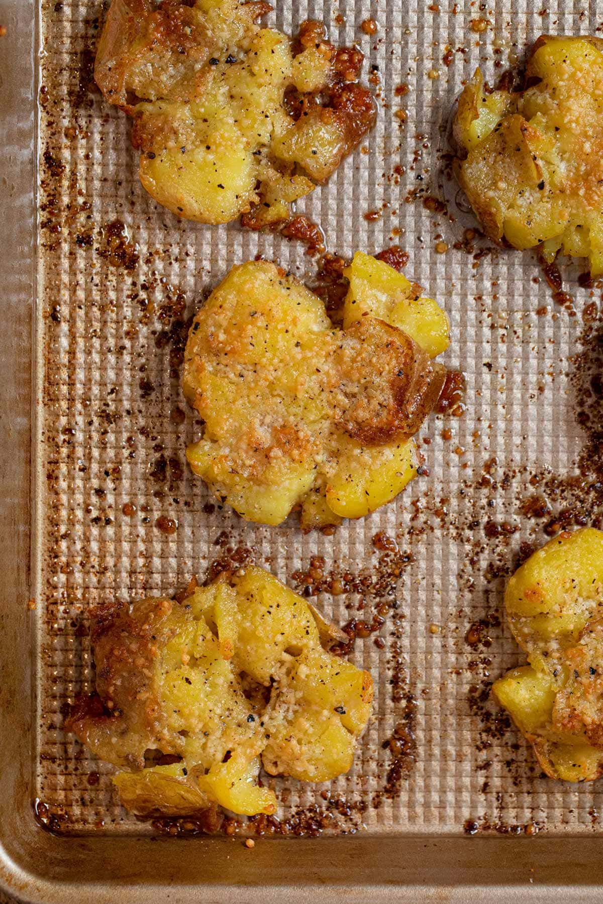 Garlic Smashed Potatoes on baking sheet