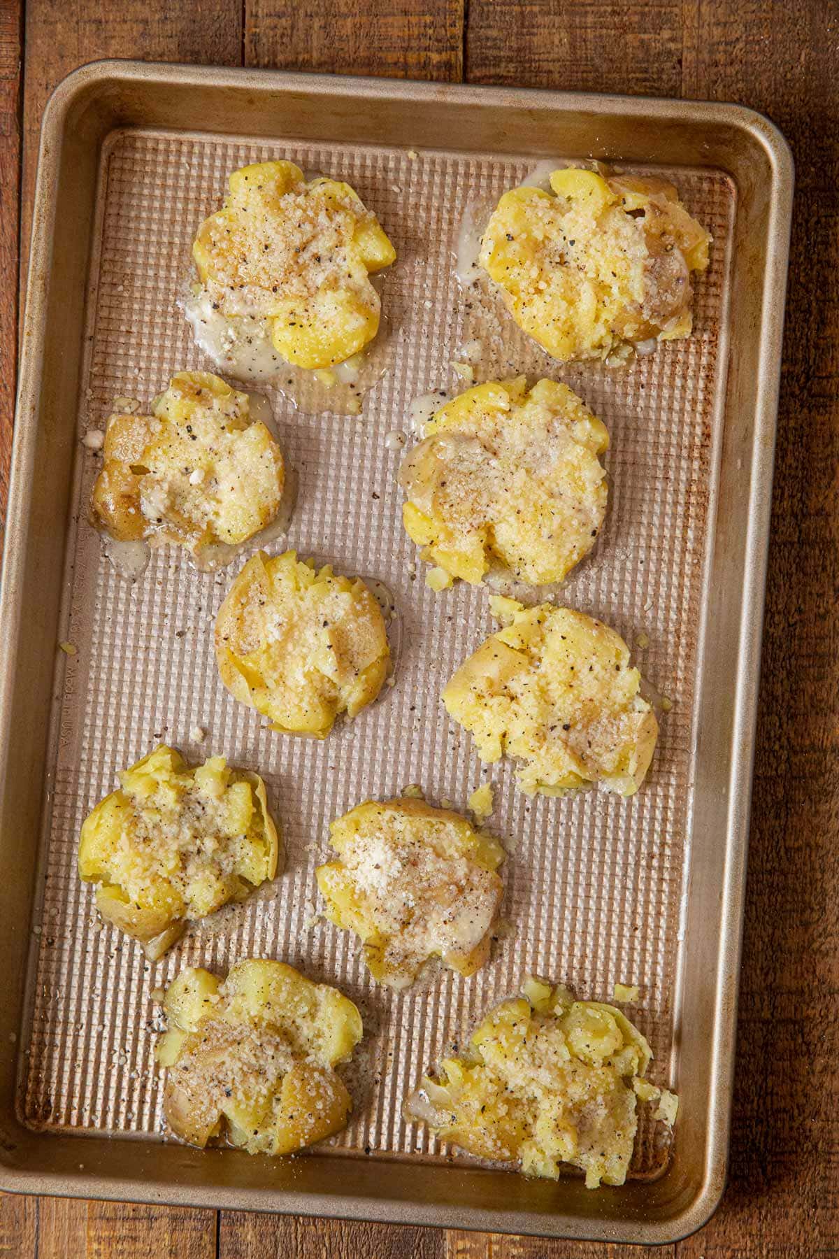 Garlic Smashed Potatoes on baking sheet before cooking