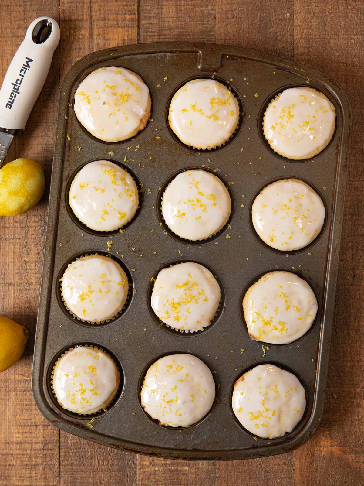 Iced Lemon Muffins in cupcake tin