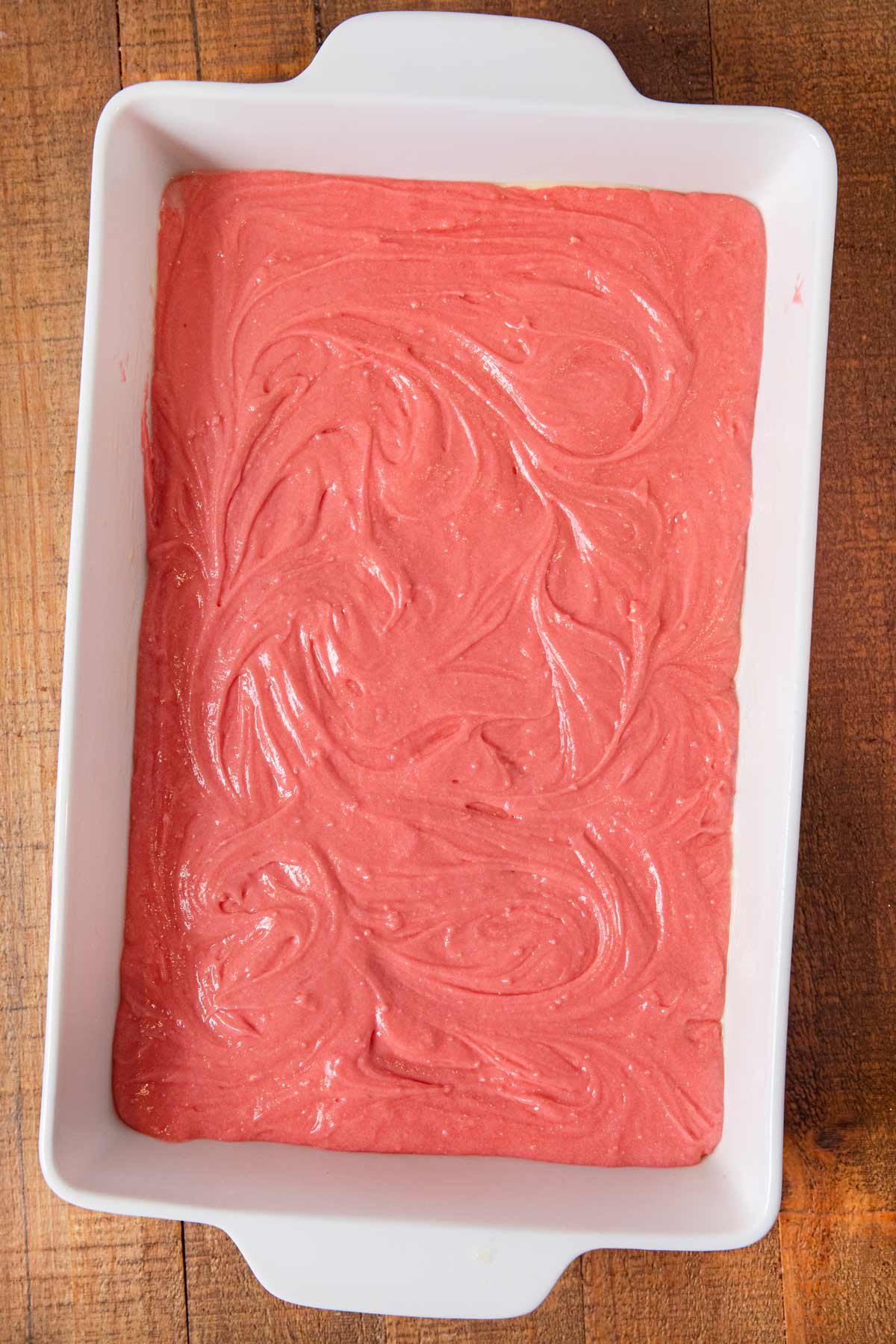 Iced Strawberry Brownies batter in baking dish