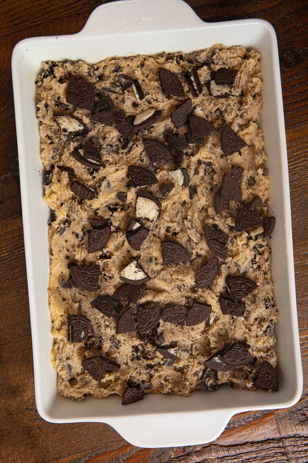 Oreo Blondies batter in baking dish before baking