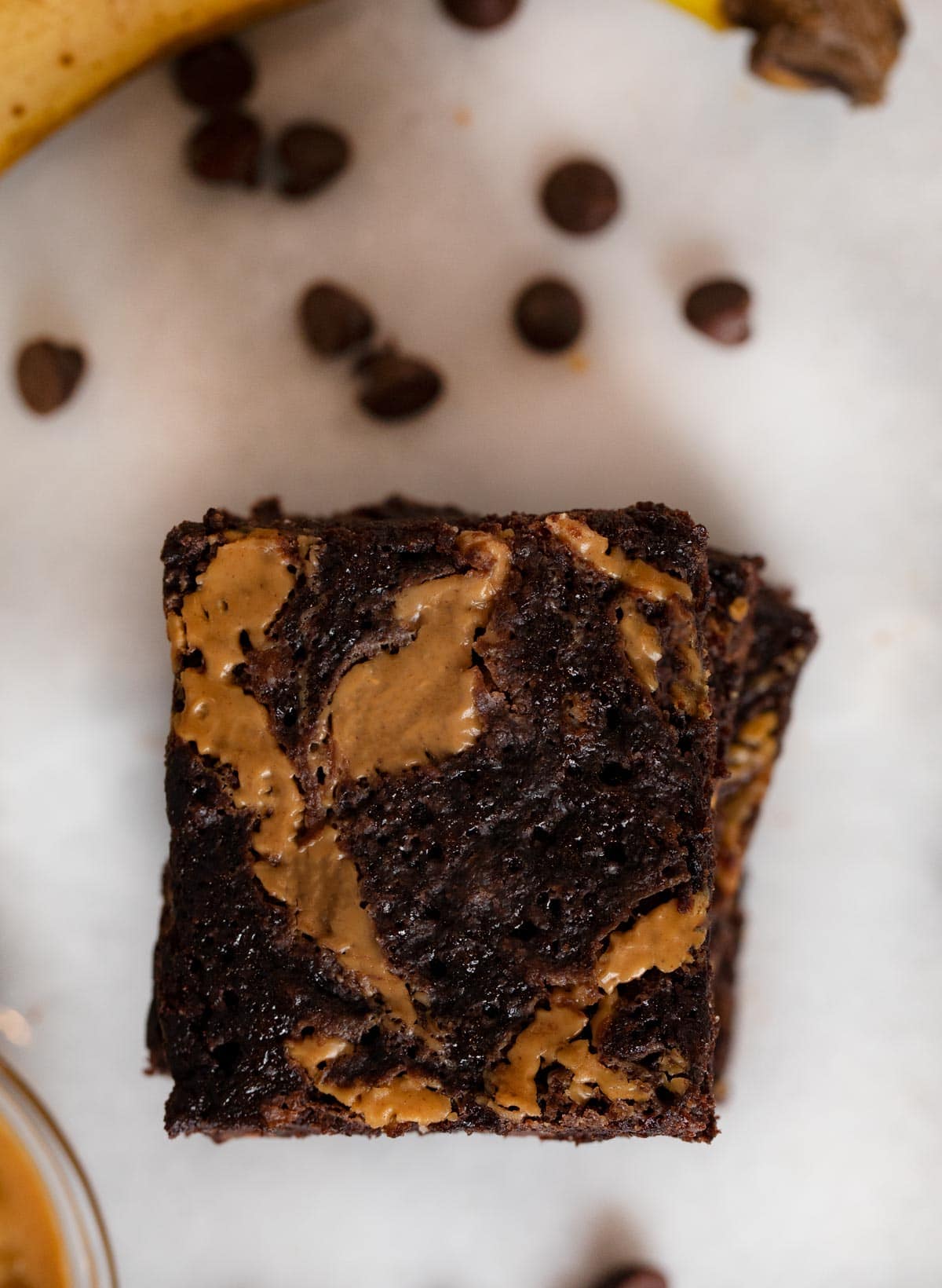top-down view of Peanut Butter Chocolate Banana Brownies in stack