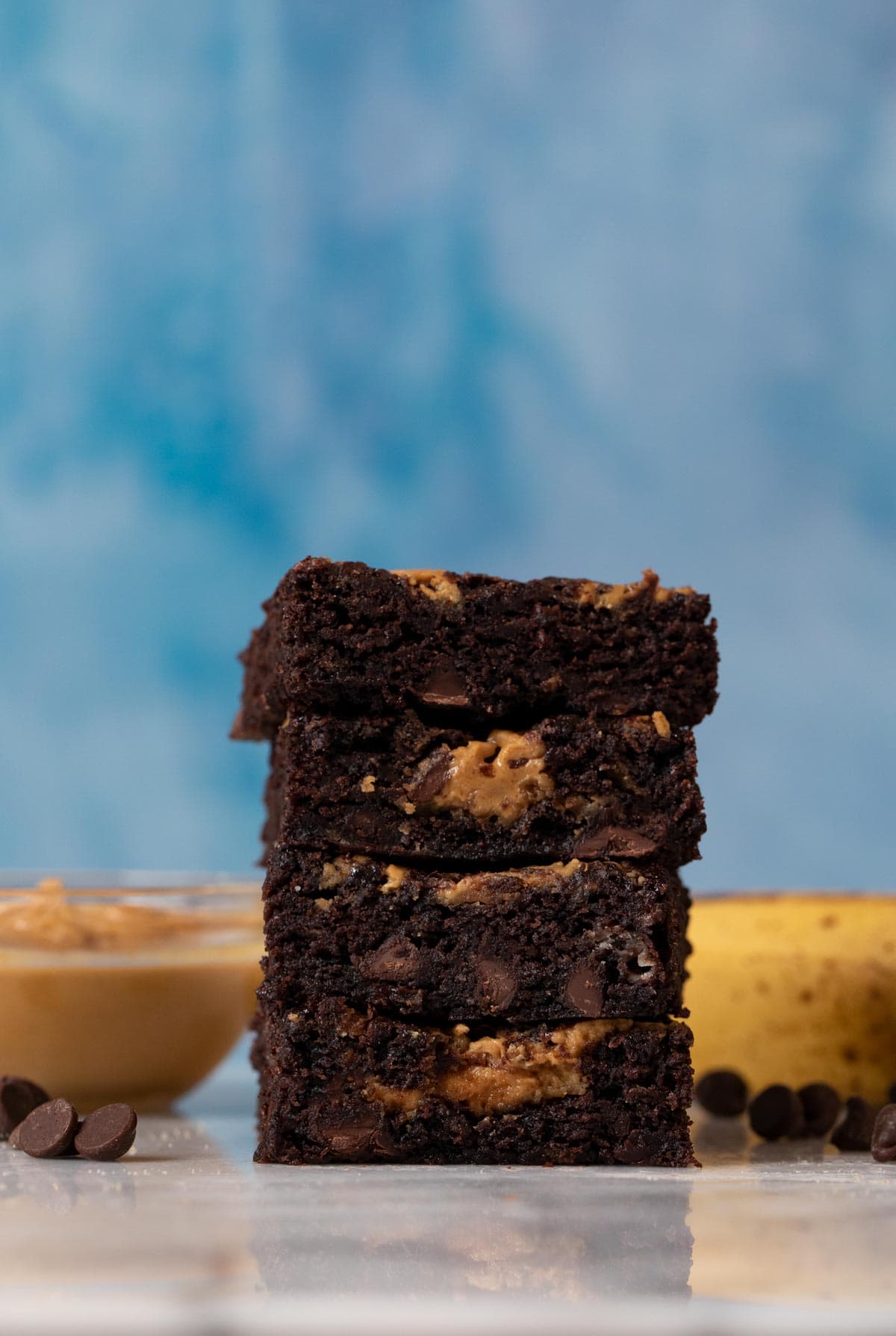 Peanut Butter Chocolate Banana Brownies in stack