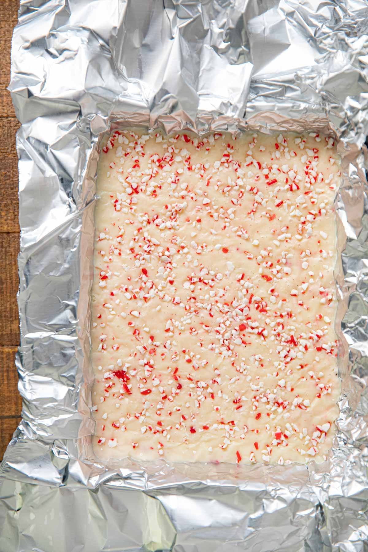 White Chocolate Peppermint Fudge in foil-lined baking dish