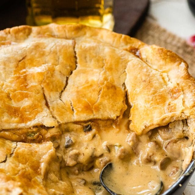 Philly Cheesesteak Pot Pie sliced open with spoon