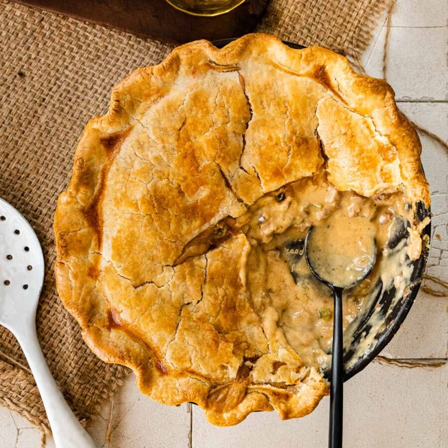 Philly Cheesesteak Pot Pie sliced open with spoon
