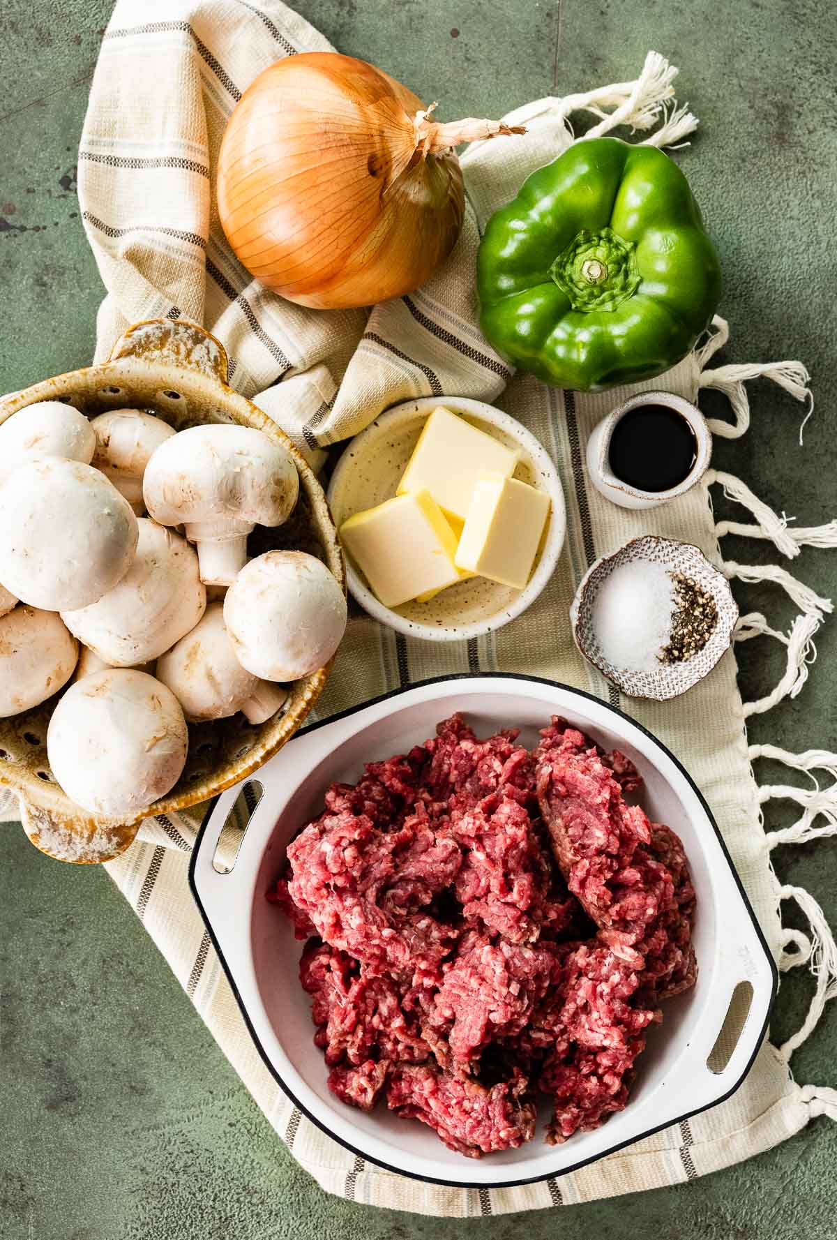 Ingredients for Philly Cheesesteak Shepherd's Pie in prep bowls