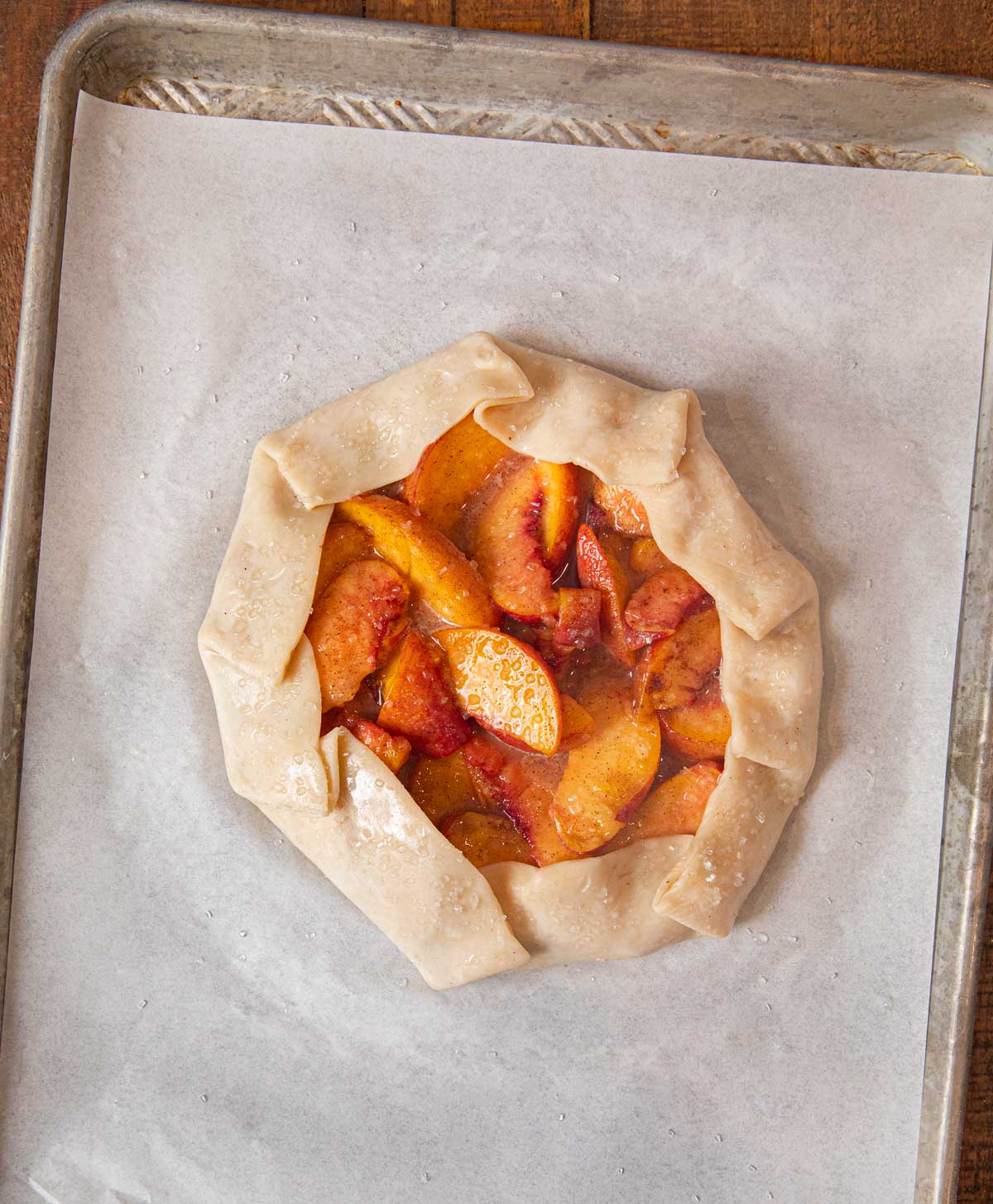Rustic Peach Galette on baking sheet before baking