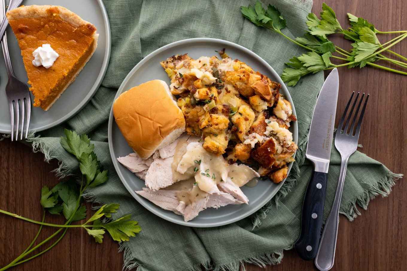 Sausage and Herb Stuffing on plate with turkey and gravy