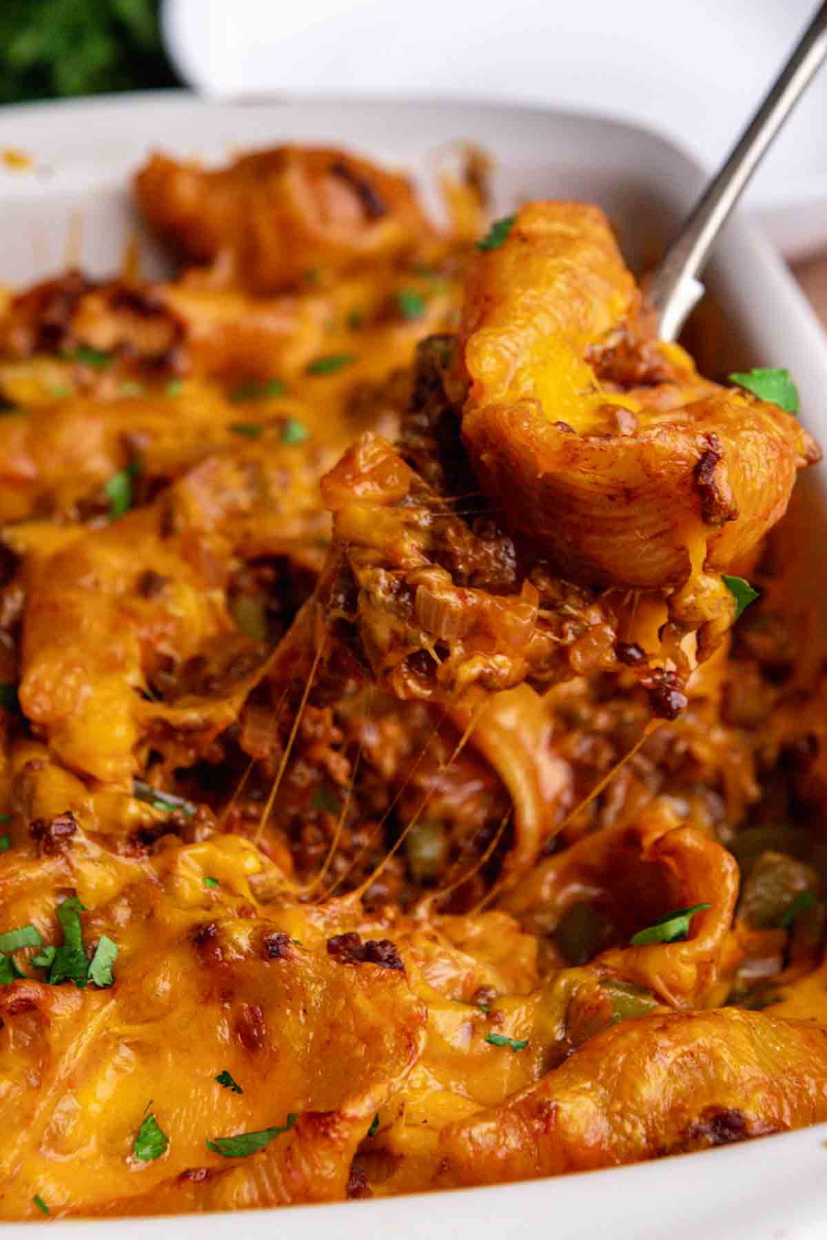 Sloppy Joe Pasta in baking dish with serving spoon