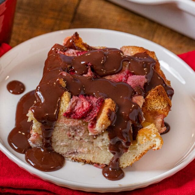 Strawberry Nutella Bread Pudding serving on plate with Nutella sauce