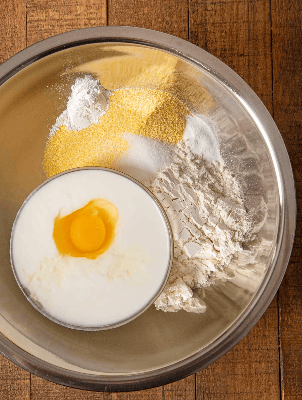 dry ingredients, egg, and buttermilk in a bowl