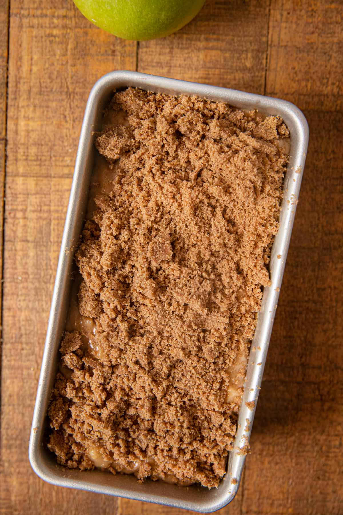 Apple Pie Bread batter and topping in baking pan before baking