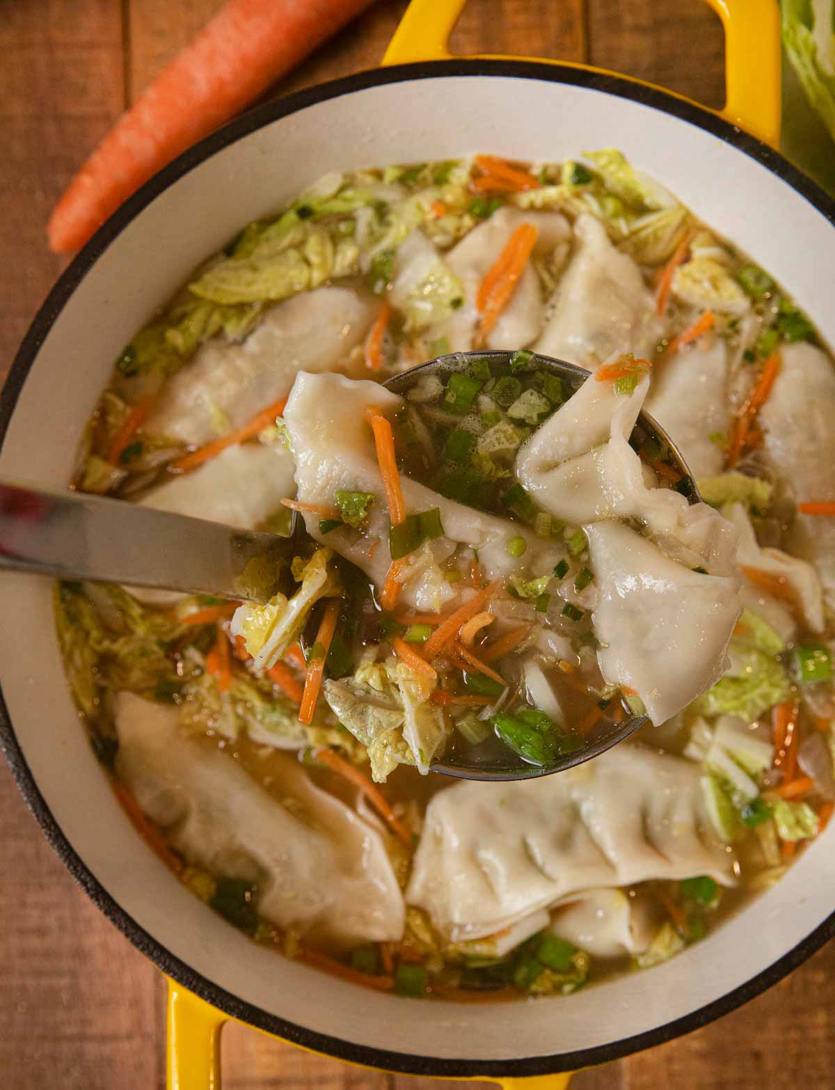 Asian Potsticker Soup serving in ladle