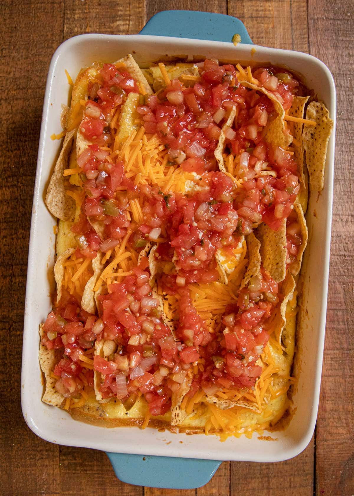 Cheesy Baked Chilaquiles in baking dish before baking