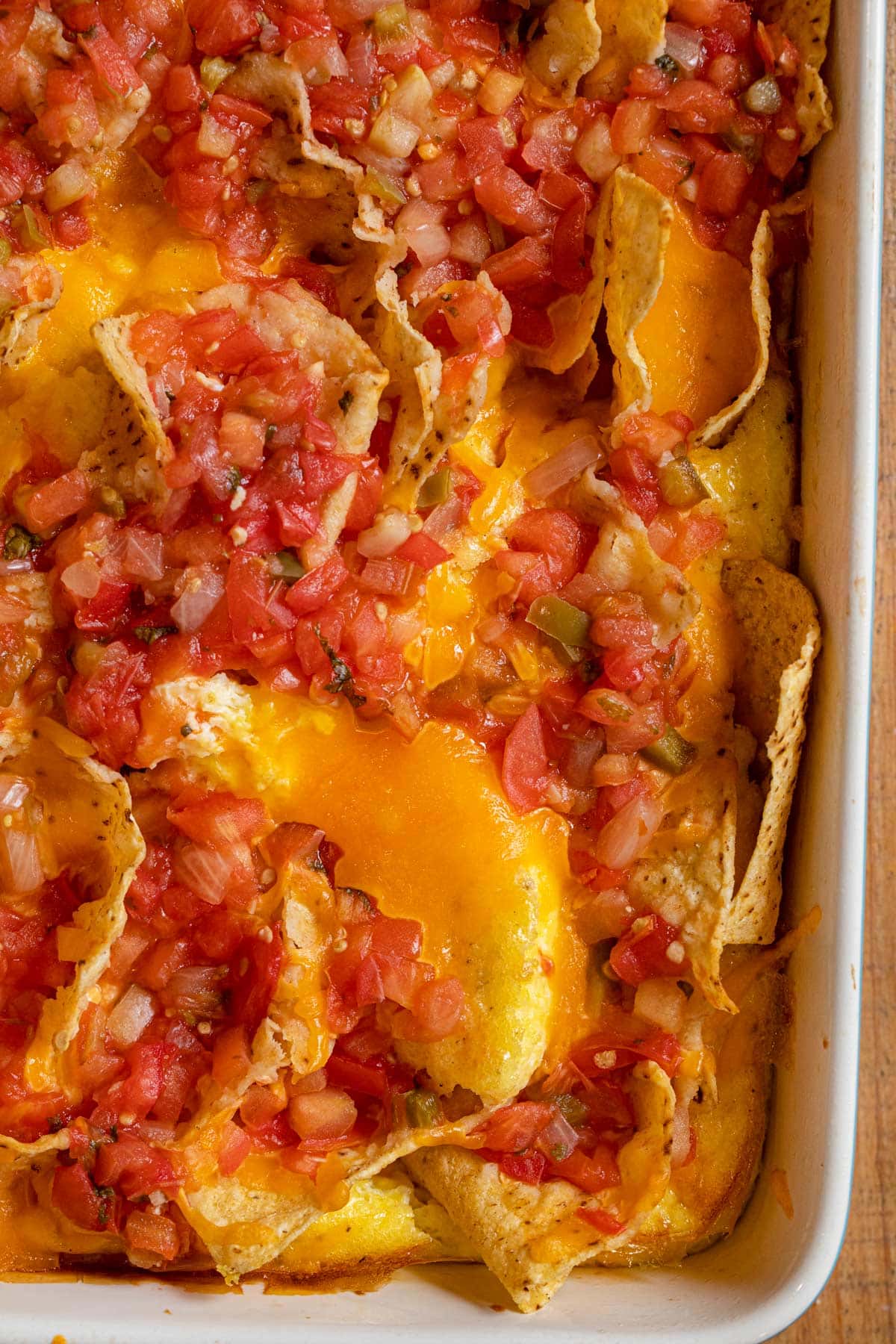 close-up of Cheesy Baked Chilaquiles in baking dish