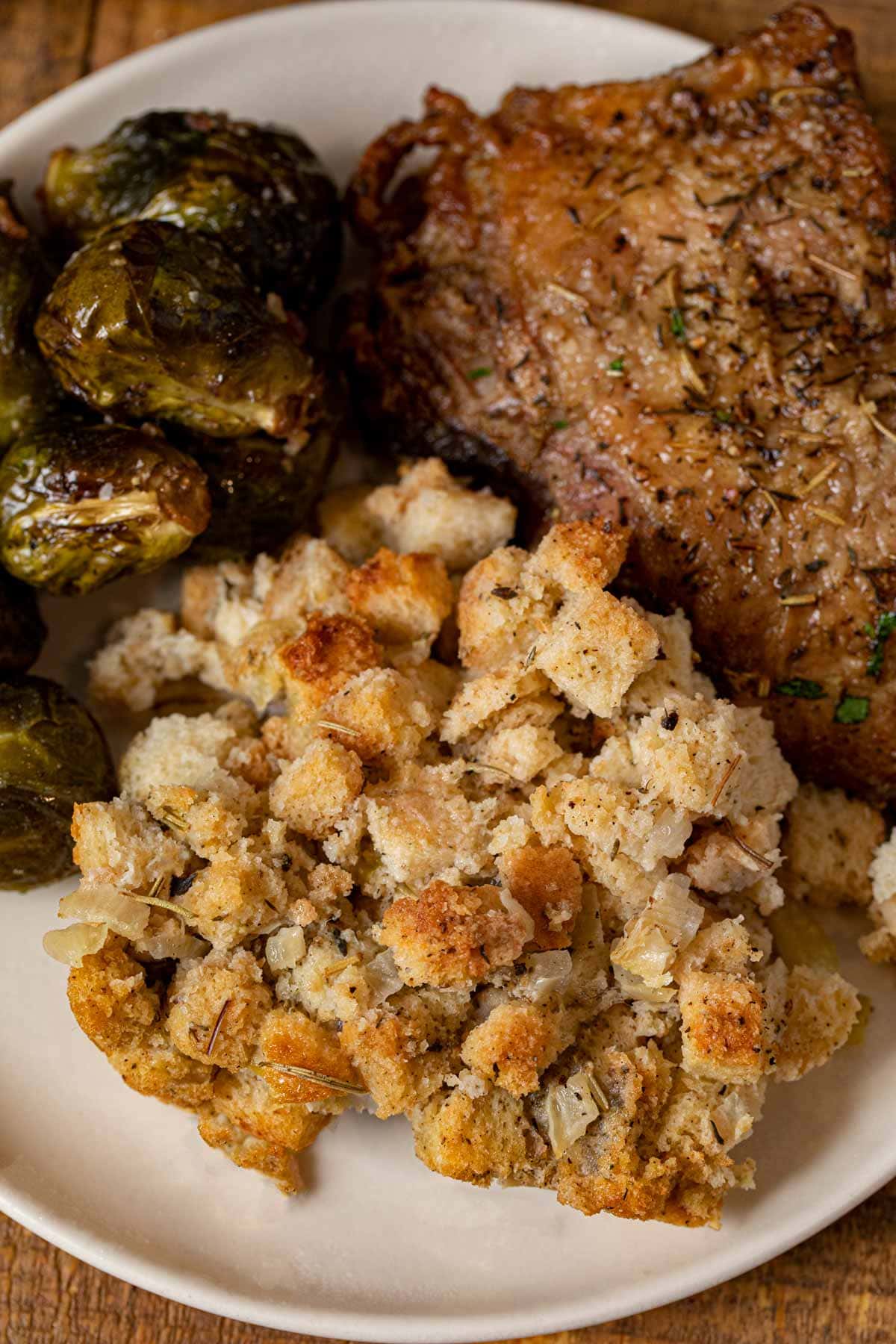 Classic Cube Stuffing on plate with turkey and Brussels sprouts