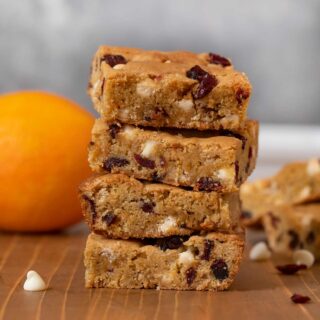 White Chocolate Cranberry Blondies with Orange in a stack