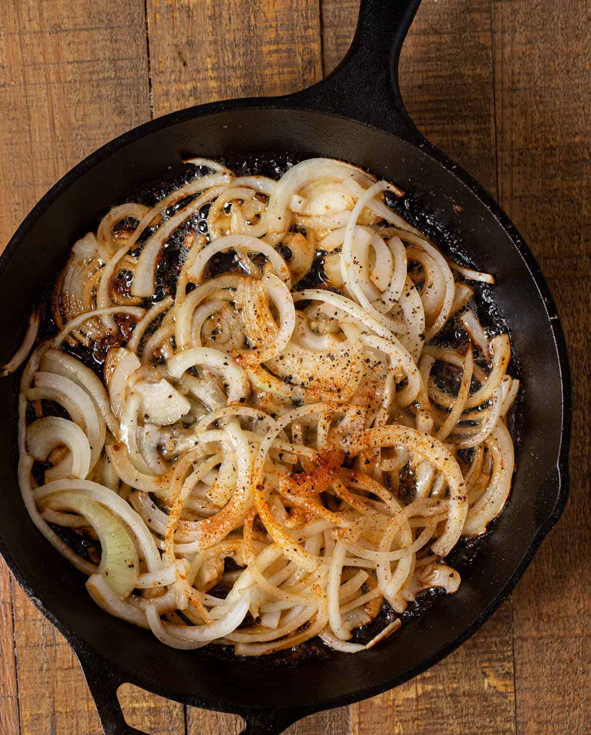 Cube Steak and Gravy onions in skillet