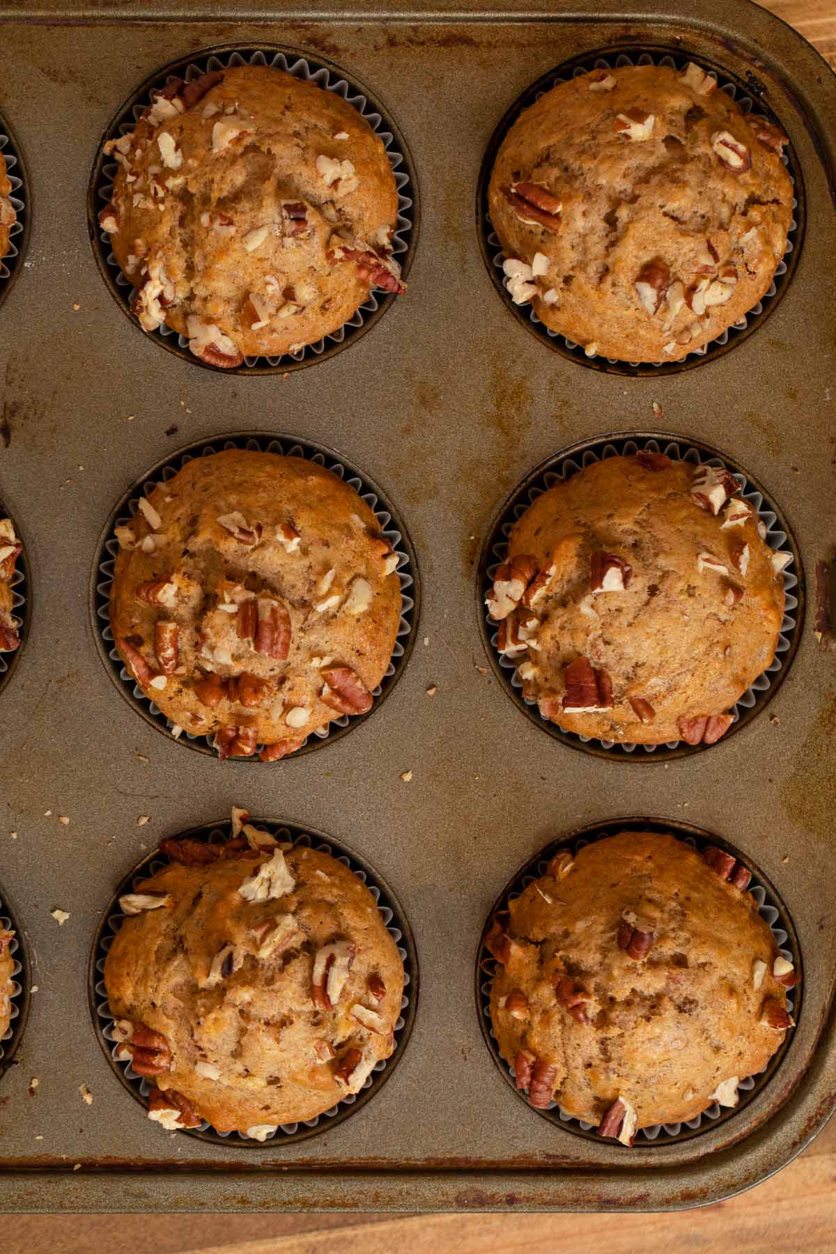 close-up of Honey Banana Muffins in muffin tin