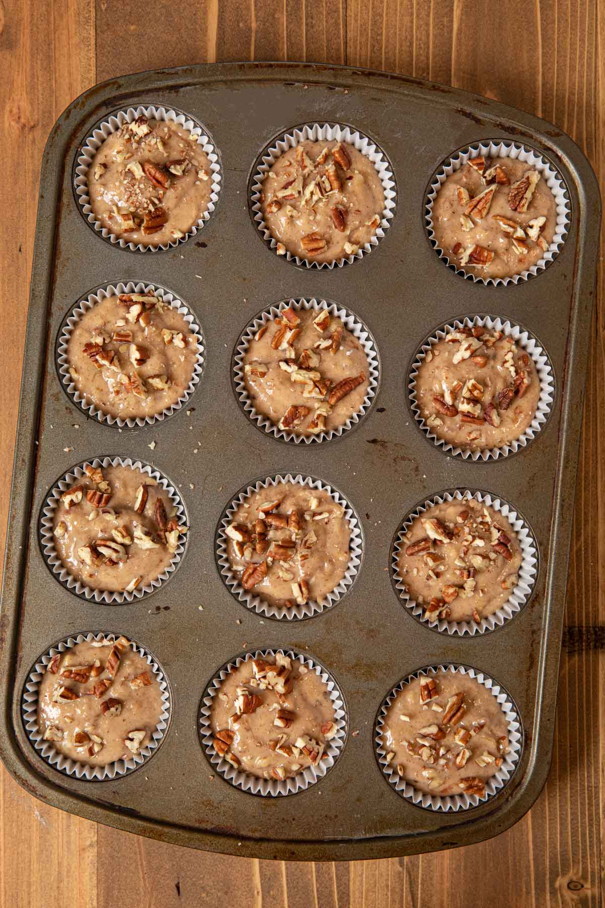 Honey Banana Muffins batter in muffin tin