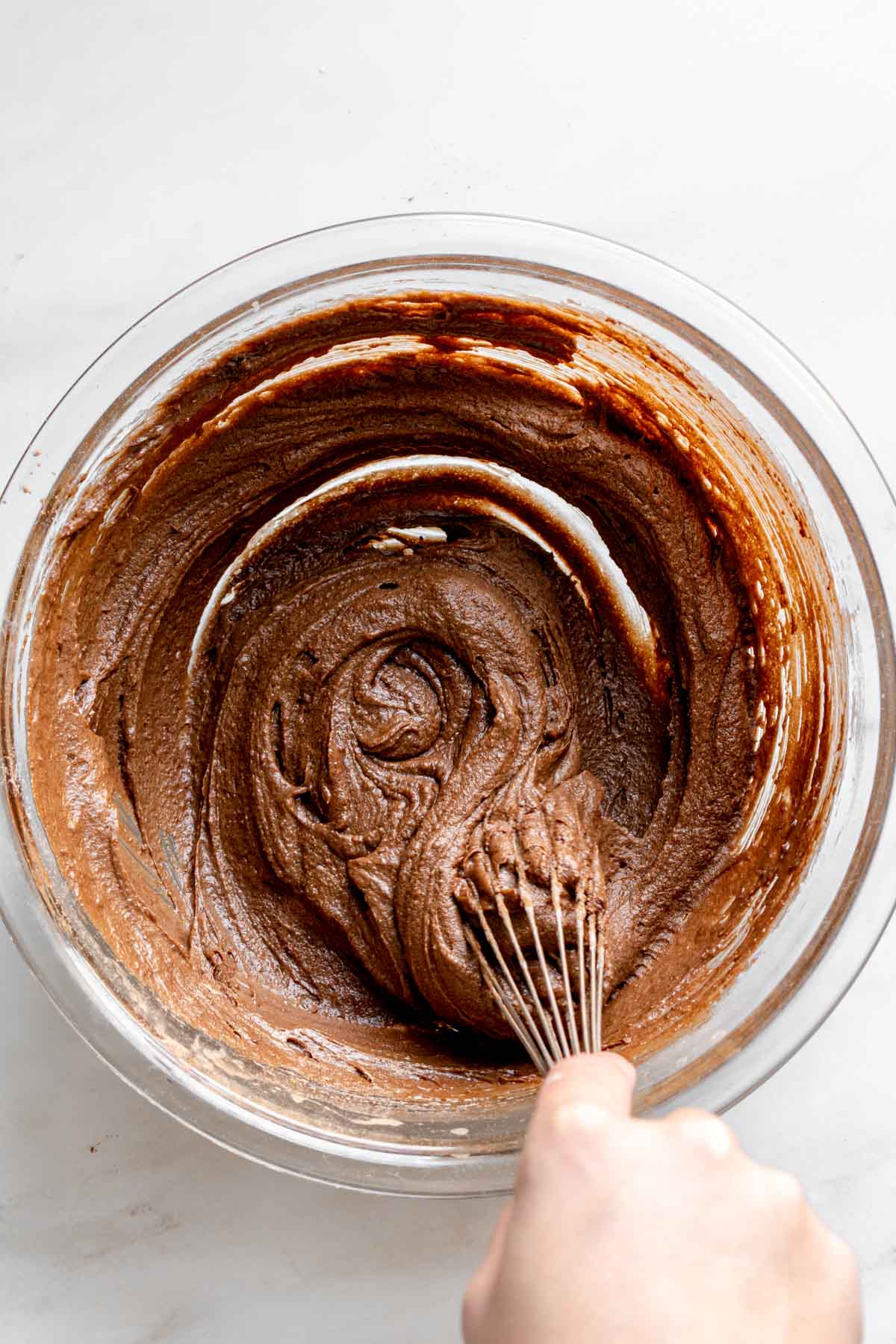 Peanut Butter Truffle Brownies batter in mixing bowl with whisk