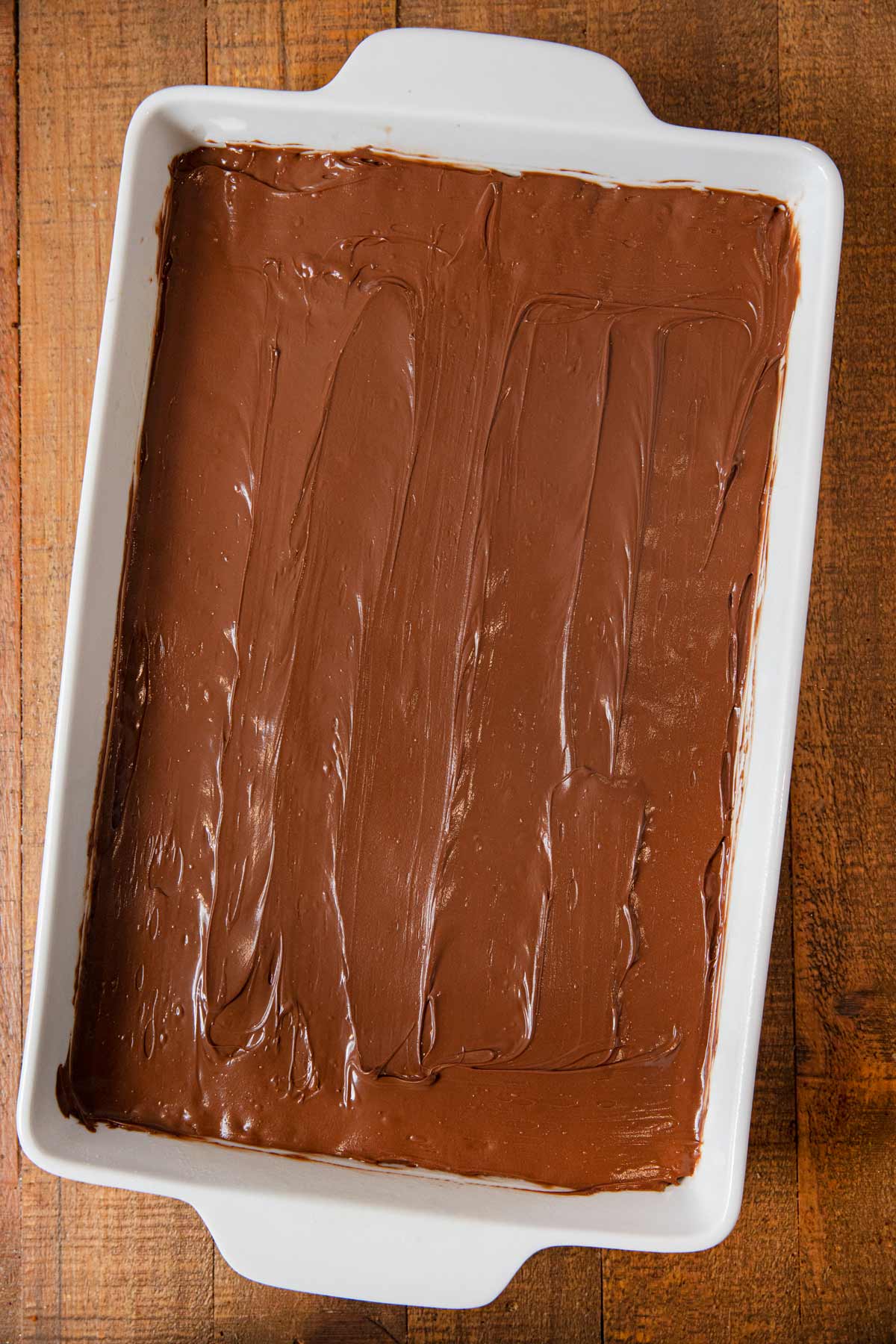 Scotcheroos in baking dish, coated before cooling