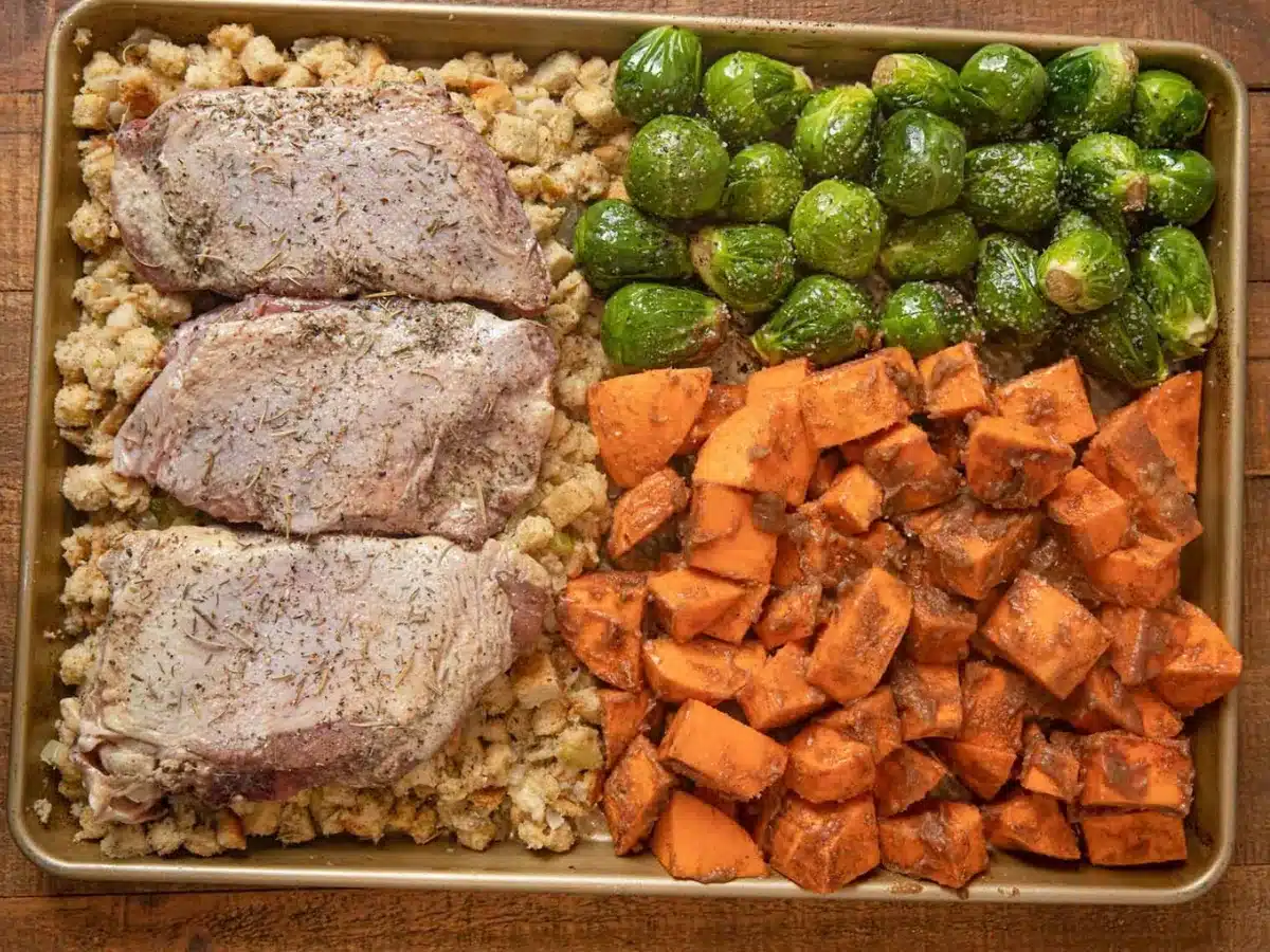 Turkey and sides on sheet pan ready to bake