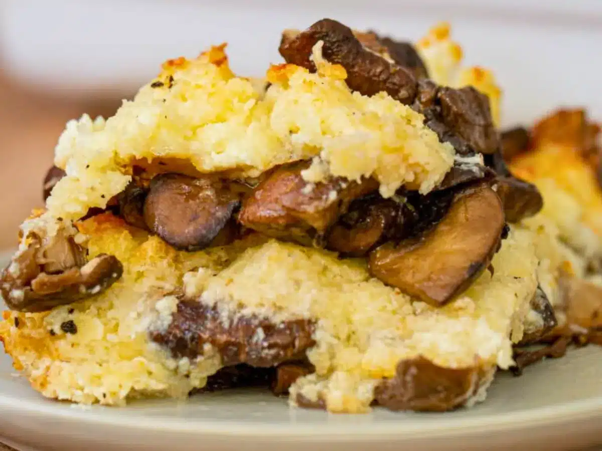 Scoop of mushrooms with cheese in between