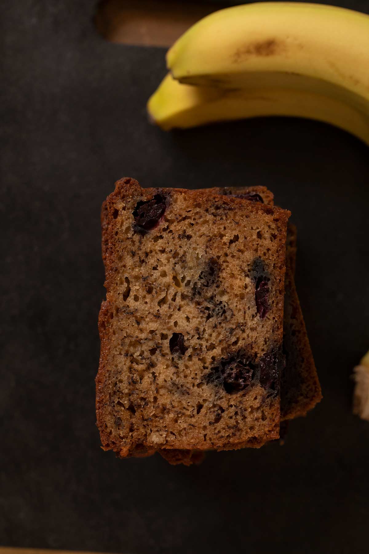 top-down view of Blueberry Banana Bread slices in stack